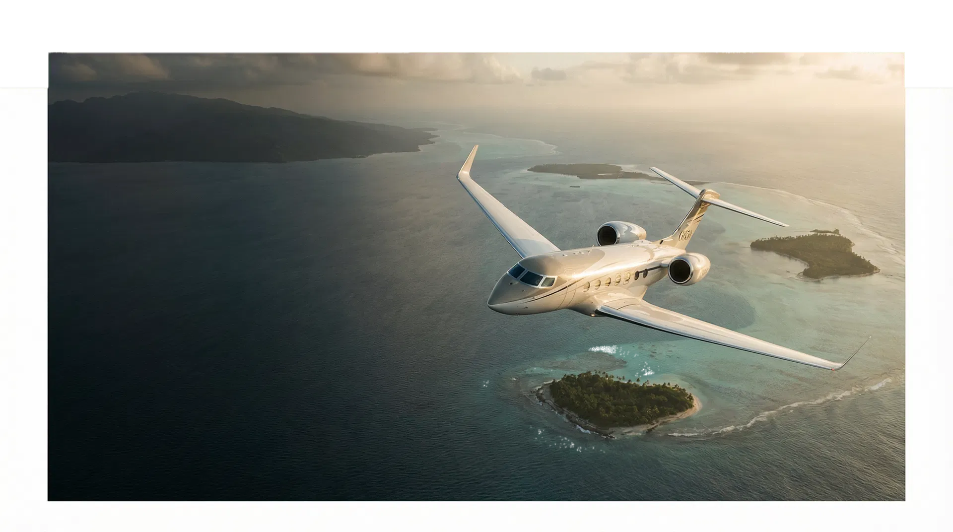 Private jet wing above island water at sunset.