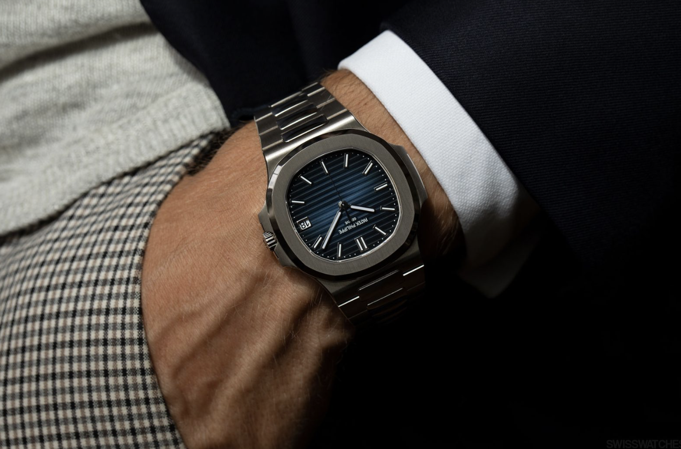 Editorial image of a luxury watch being worn on the wrist.